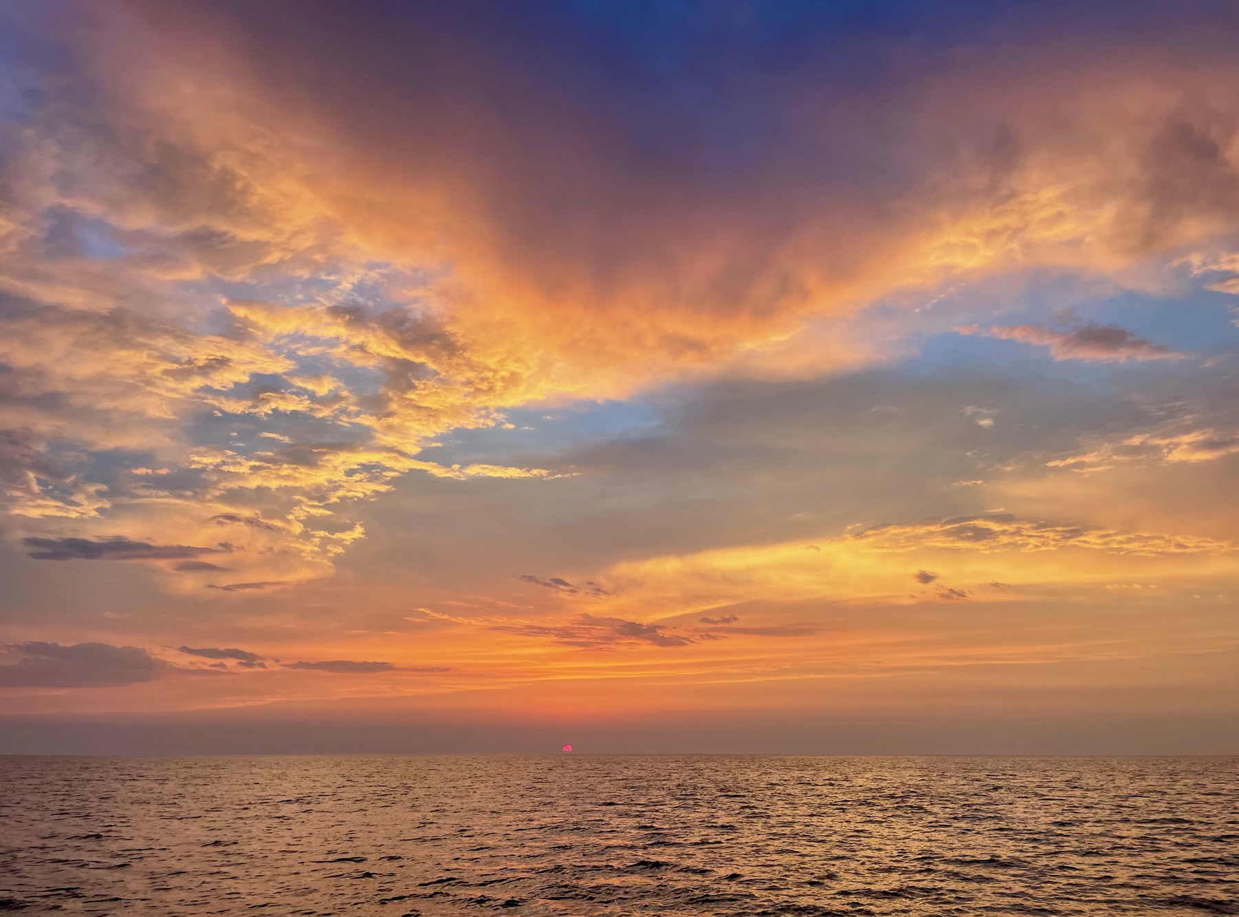 Yacht sailing at Mediterranean sunset